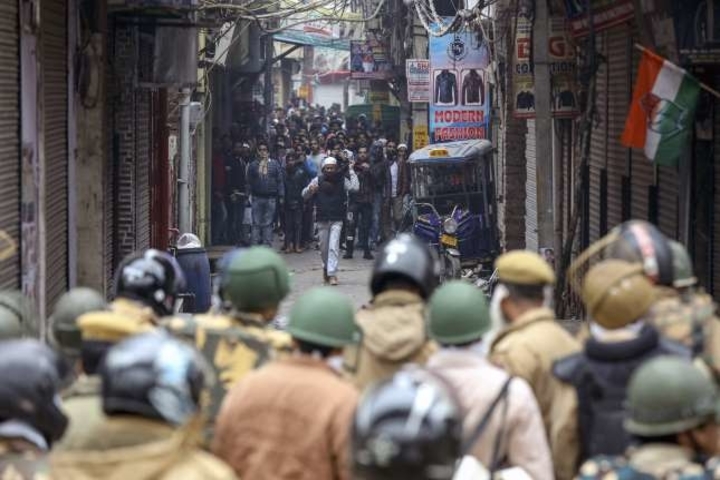 Fresh clashes over India law, death toll hits 14